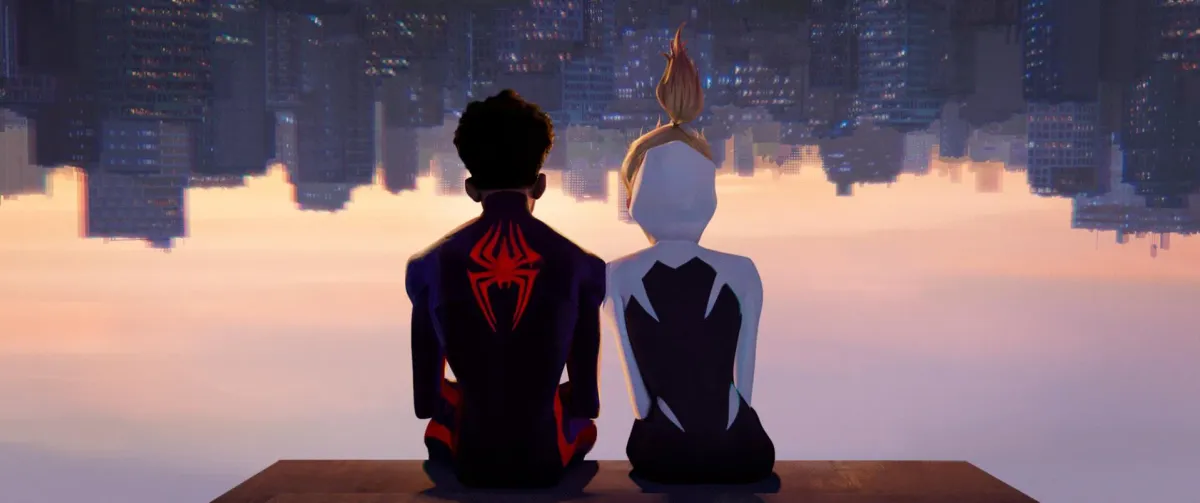 Miles Morales and Spider-Gwen sitting side by side, backs to camera, overlooking an upside-down city skyline