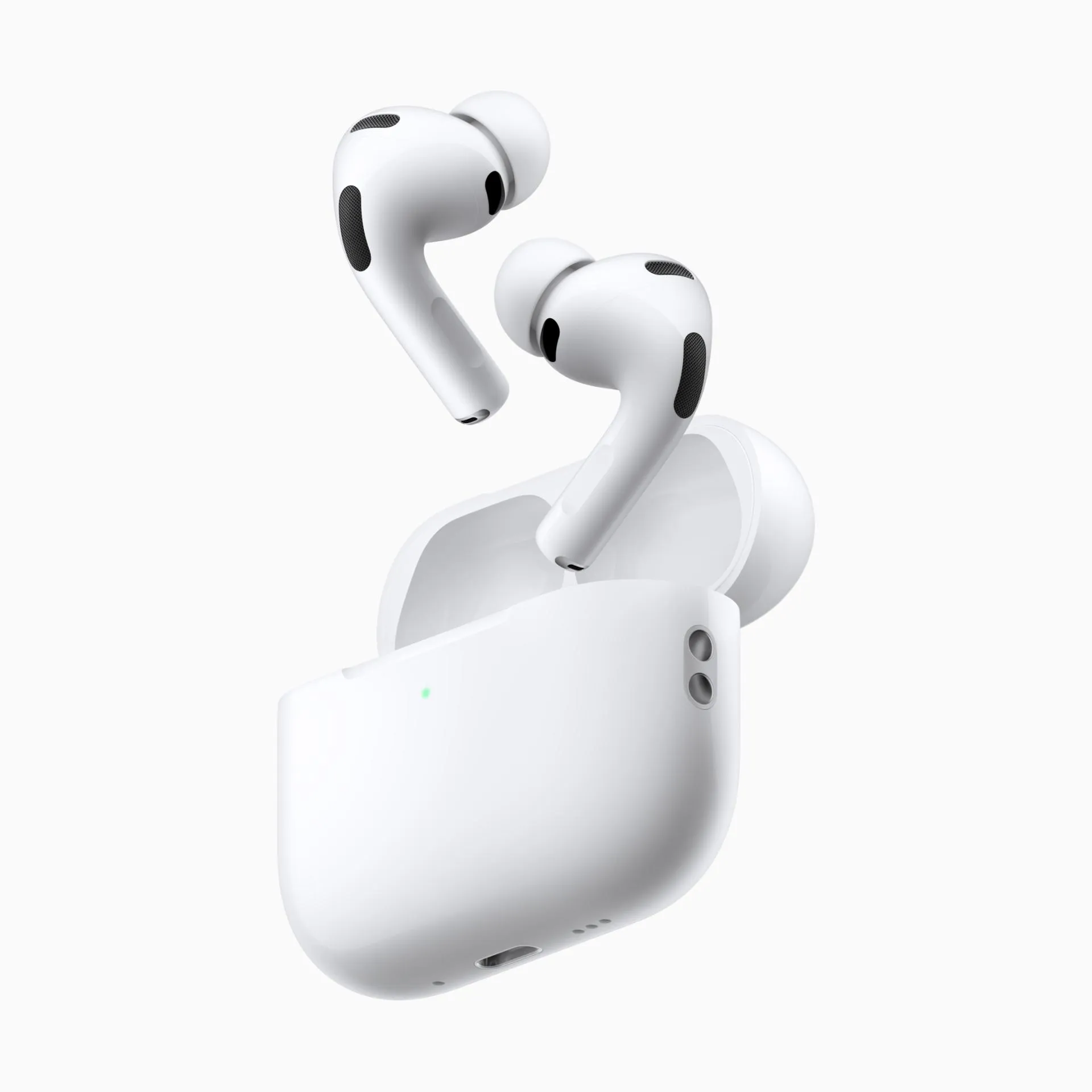 AirPods Pro 3 with charging case next to an iPhone, iPad, and Apple TV remote