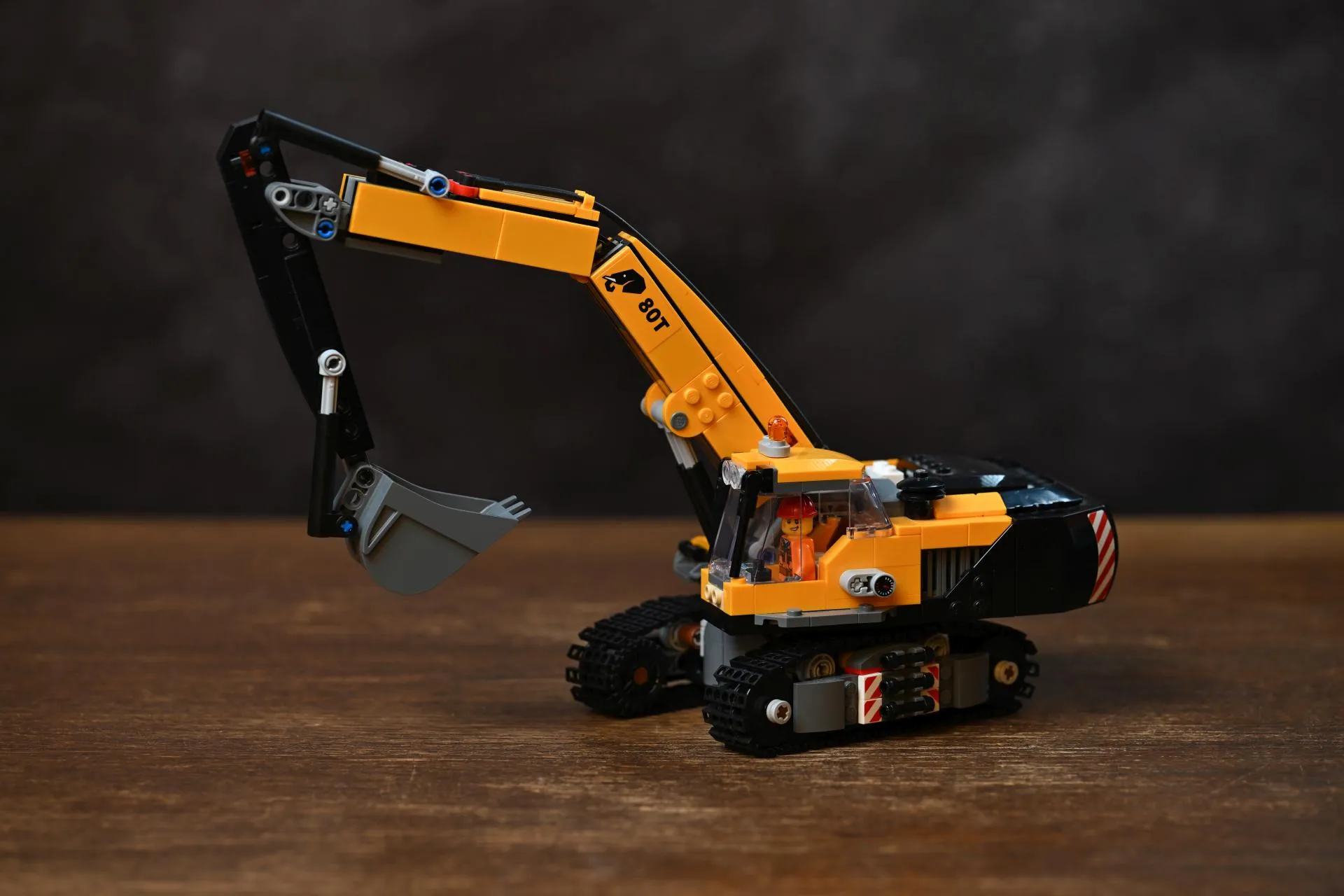 The finished LEGO City Yellow Construction Excavator (60420), showing its tracked chassis, boom arm and rotating cab