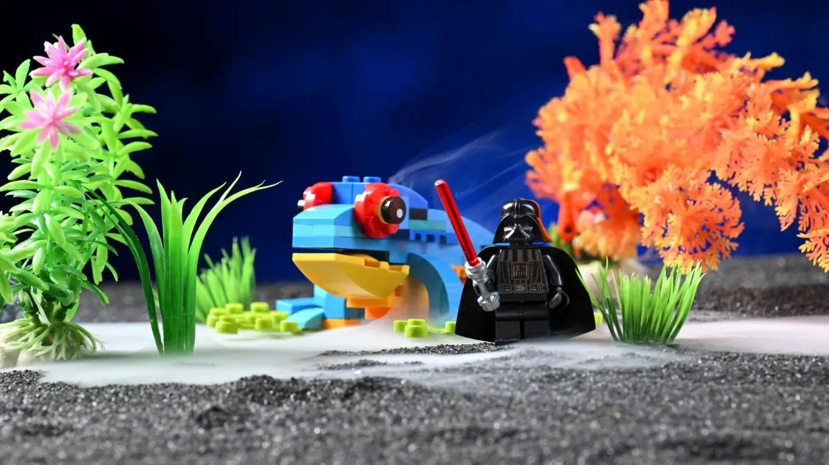 The LEGO Creator Exotic Parrot (31136) frog build in fog, with a Darth Vader minifigure standing over it