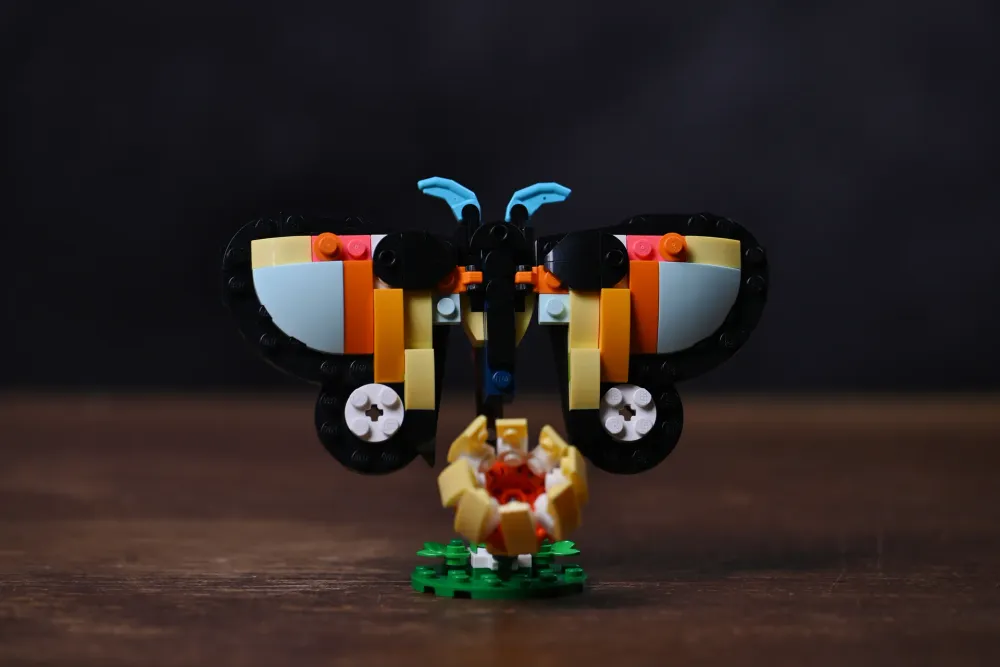 The butterfly alternate build of the LEGO Creator Tropical Toucan (31173) set, wings spread above its brick-built flower