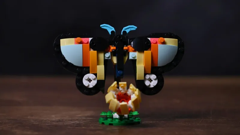The butterfly alternate build of the LEGO Creator Tropical Toucan (31173) set, wings spread above its brick-built flower