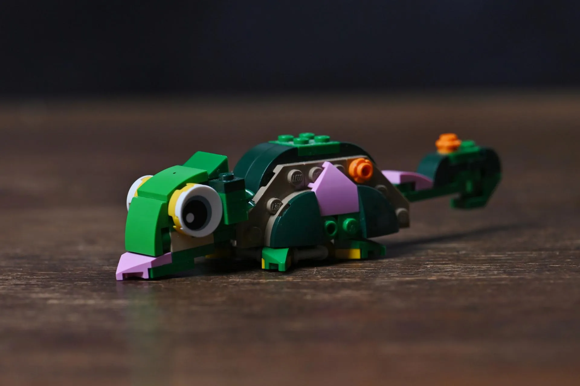 The chameleon alternate build of the LEGO Creator Turtle with a Water Lily Flower (31377) set, with big eyes and curled tail