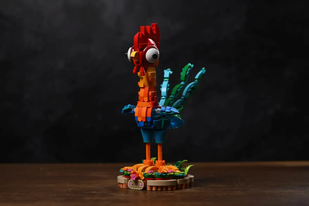 Finished LEGO Disney Moana 2 Heihei (43272) rooster model, three-quarter view showing the tail feathers and stance