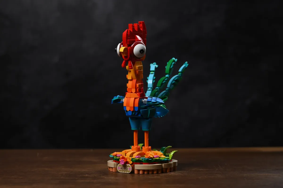 Finished LEGO Disney Moana 2 Heihei (43272) rooster model, three-quarter view showing the tail feathers and stance