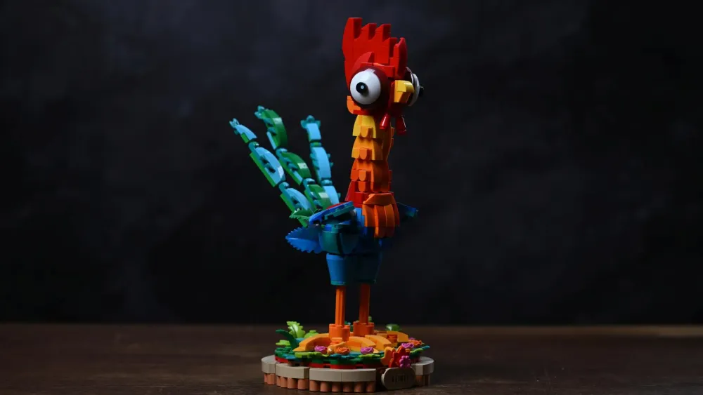 Finished LEGO Disney Moana 2 Heihei (43272) rooster model on its flower-decorated display stand