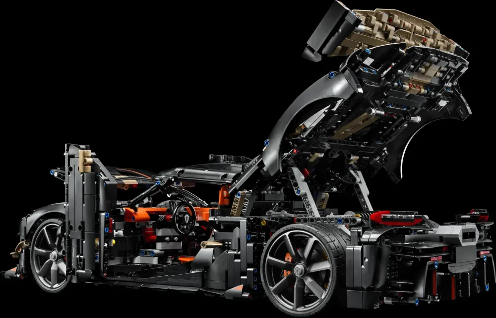 The LEGO Technic Koenigsegg Sadair's Spear Megacar (42232) with its doors, hood and mirrors open in ghost mode