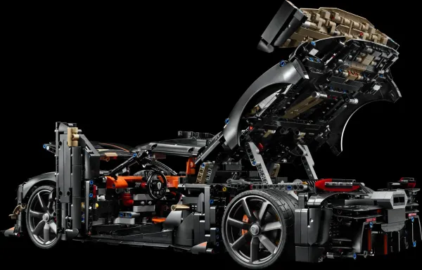 The LEGO Technic Koenigsegg Sadair's Spear Megacar (42232) with its doors, hood and mirrors open in ghost mode