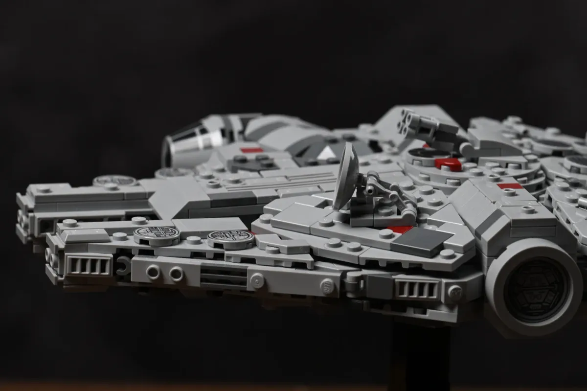 Close-up of the LEGO Millennium Falcon's cockpit, radar dish and quad-laser cannon detailing