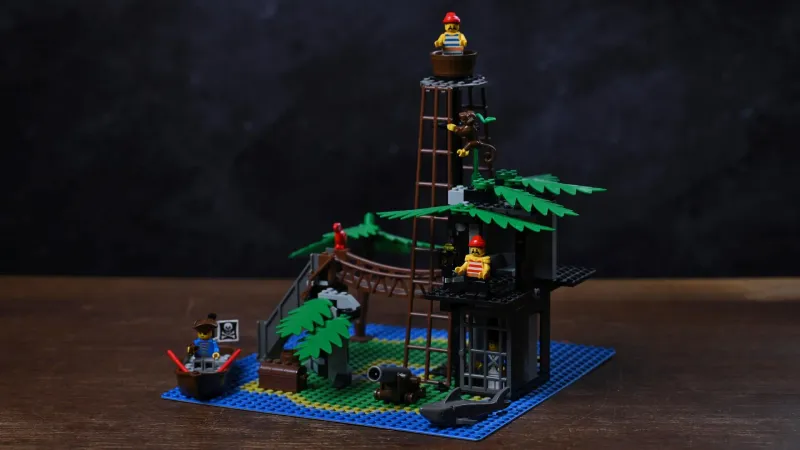 The complete LEGO Pirates Forbidden Island (6270) set from 1989, fully built after 35 years, with its watchtower lookout, rope bridge, dungeon, and rowboat