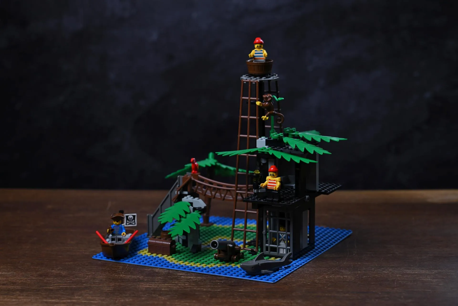 The complete LEGO Pirates Forbidden Island (6270) set from 1989, fully built after 35 years, with its watchtower lookout, rope bridge, dungeon, and rowboat