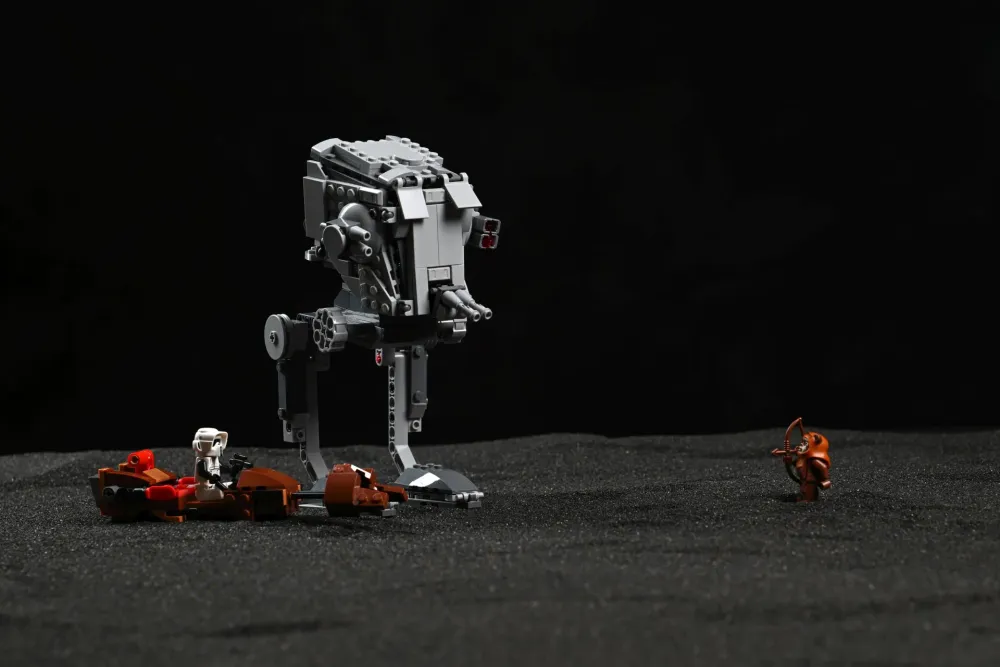 The LEGO Star Wars AT-ST Attack on Endor (75424) with a Scout Trooper riding the hijacked speeder bike, facing off against Wicket the Ewok with his bow
