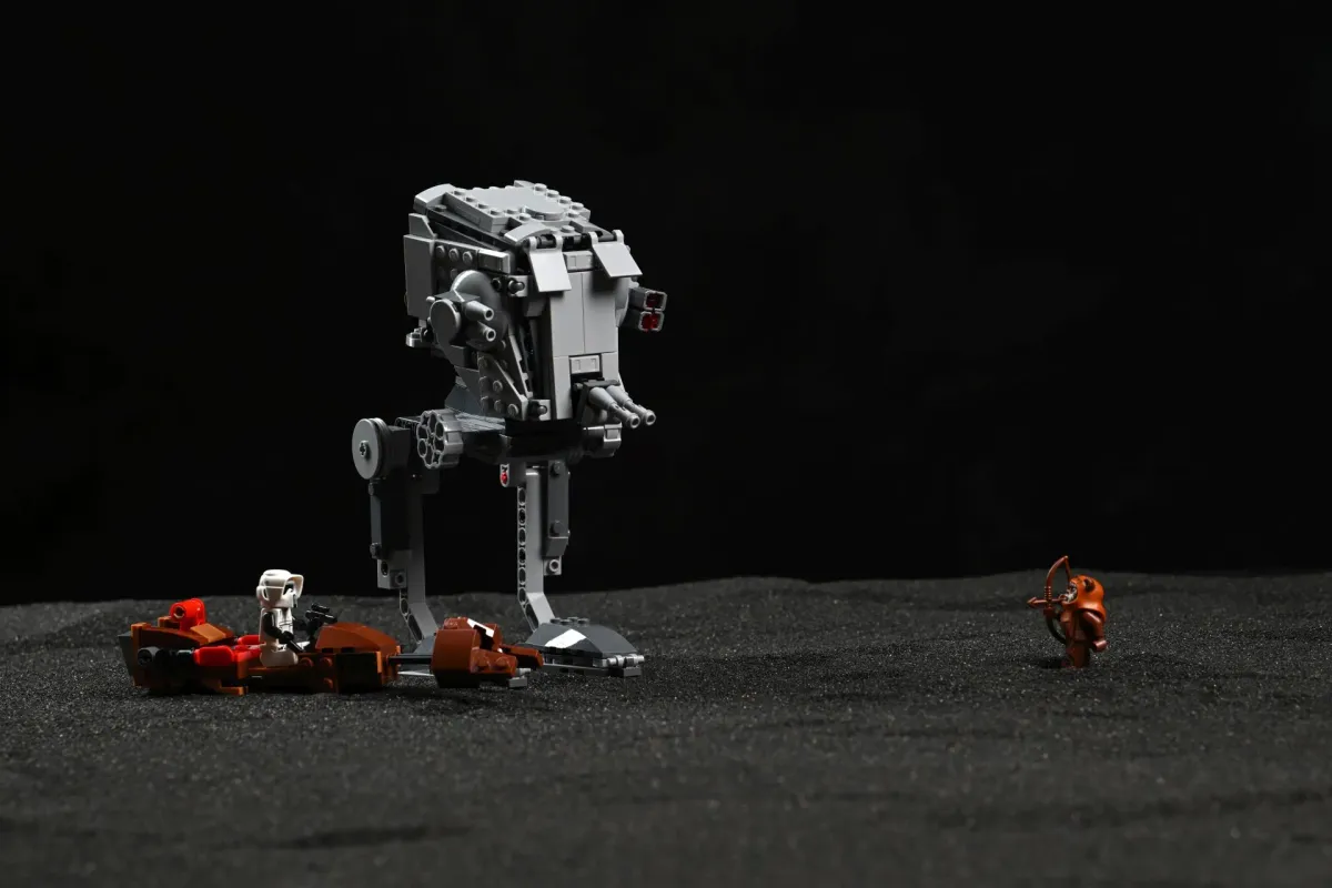 The LEGO Star Wars AT-ST Attack on Endor (75424) with a Scout Trooper riding the hijacked speeder bike, facing off against Wicket the Ewok with his bow