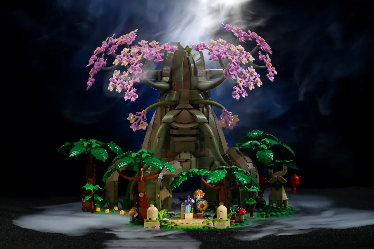 The LEGO Zelda Great Deku Tree (77092) staged with a top-down godray spotlight cutting through haze and illuminating Link and the Master Sword
