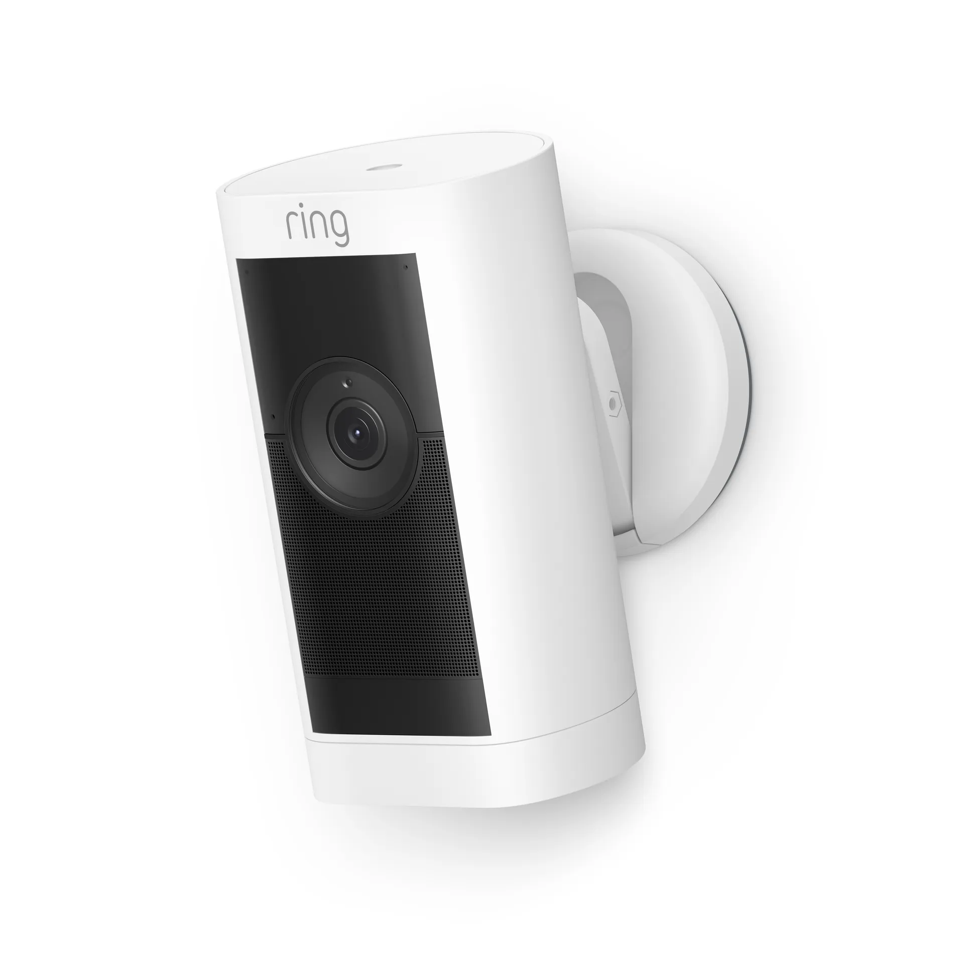 A Ring outdoor camera mounted on the exterior wall of a family home