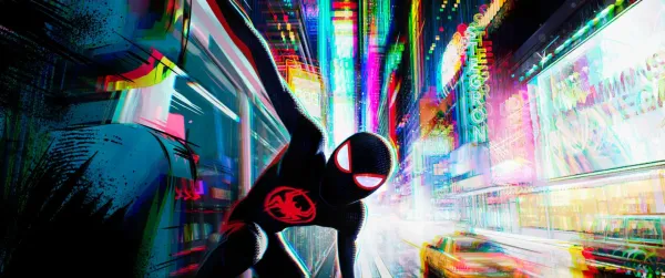 Miles Morales swinging through a neon-lit city street in Spider-Man: Beyond the Spider-Verse
