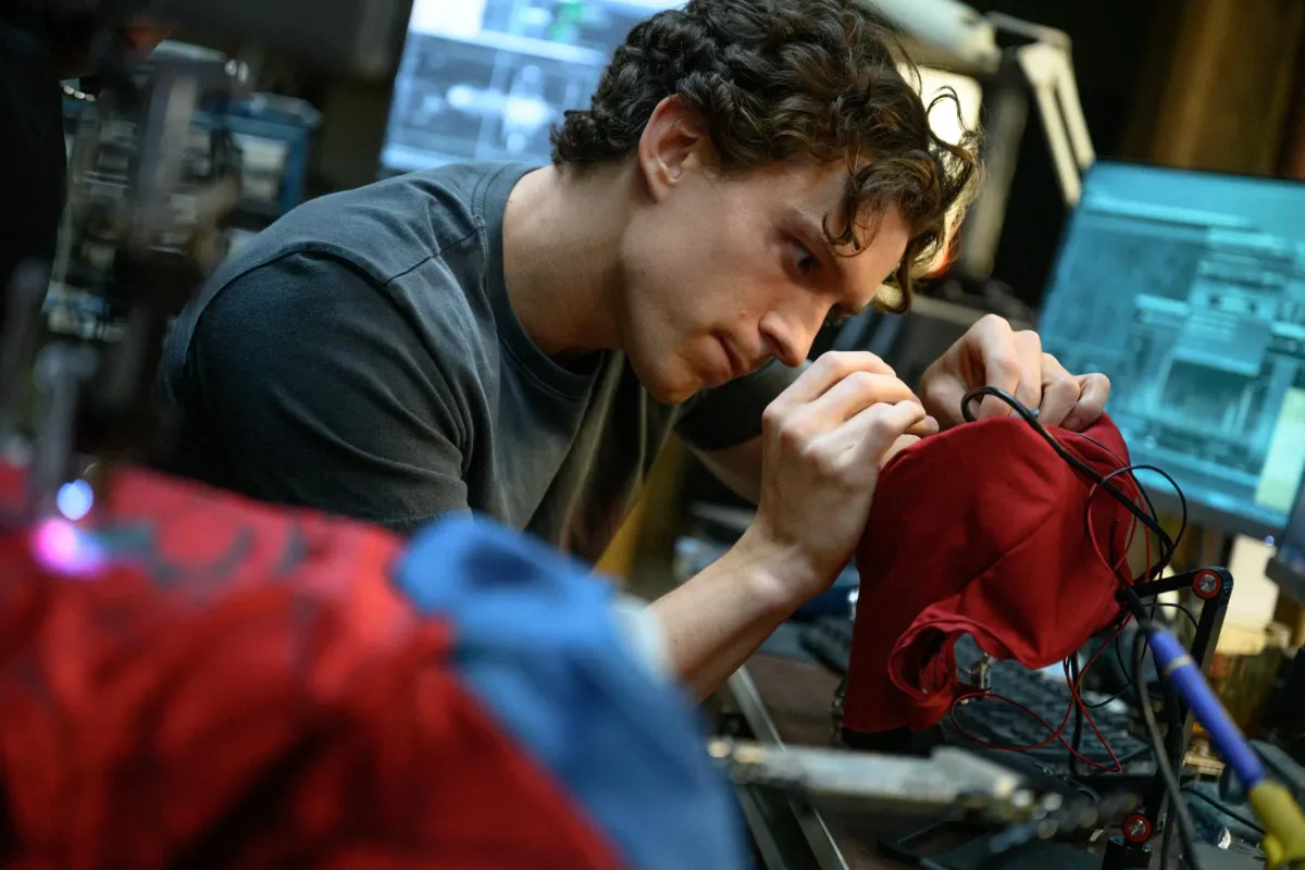 Peter Parker working on his Spider-Man suit in Spider-Man: Brand New Day