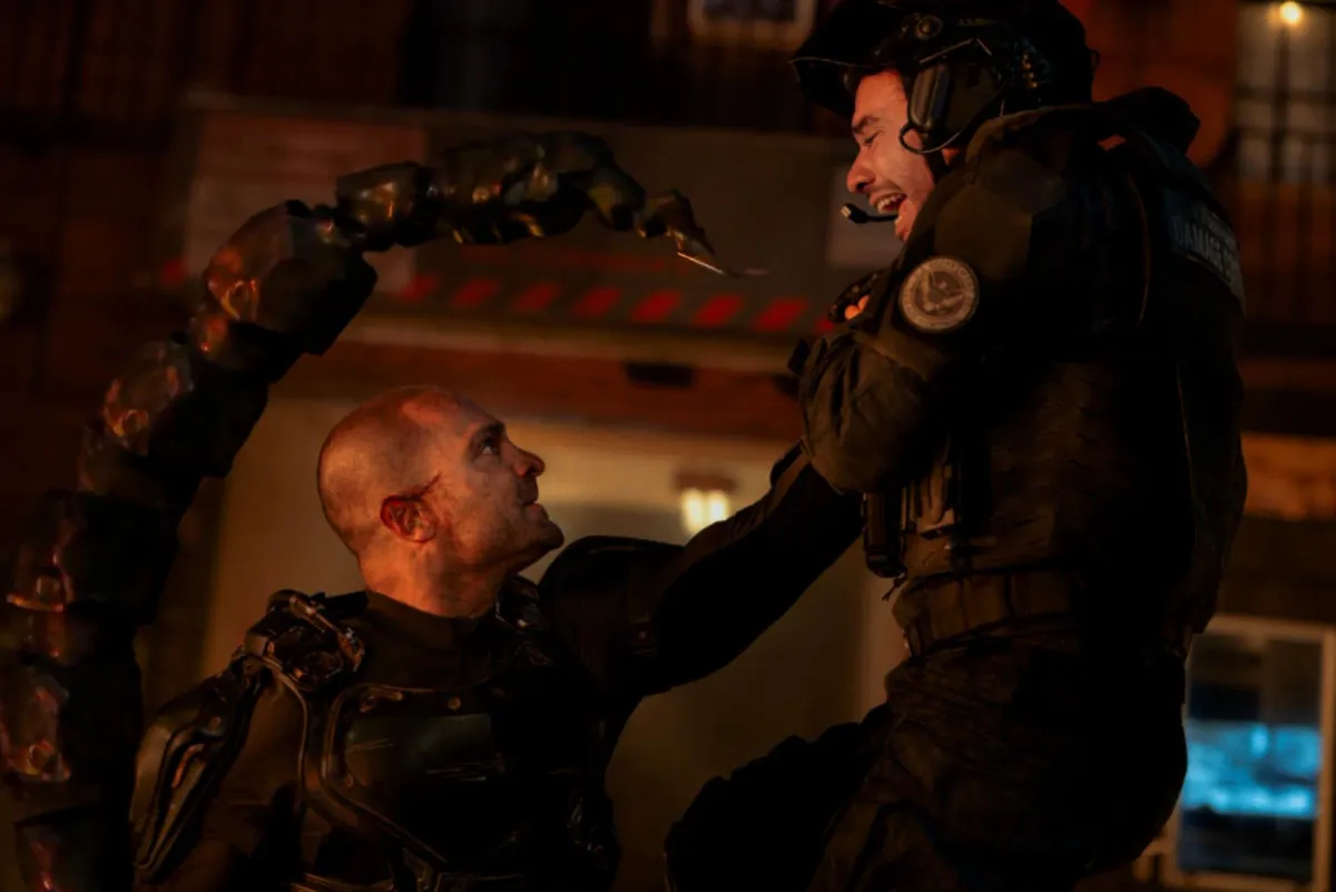 Michael Mando's Scorpion confronting a Department of Damage Control agent in Spider-Man: Brand New Day