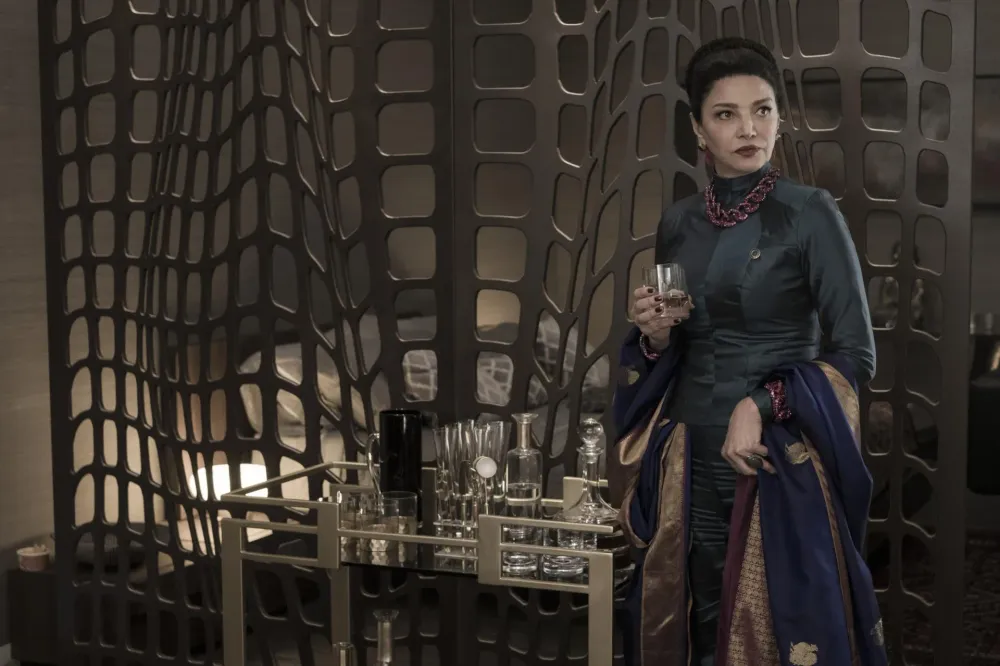 A Belter official aboard a ship in a scene from The Expanse Season 4